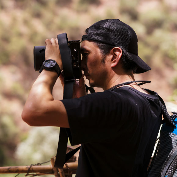 Yuto fotografeert met een camera